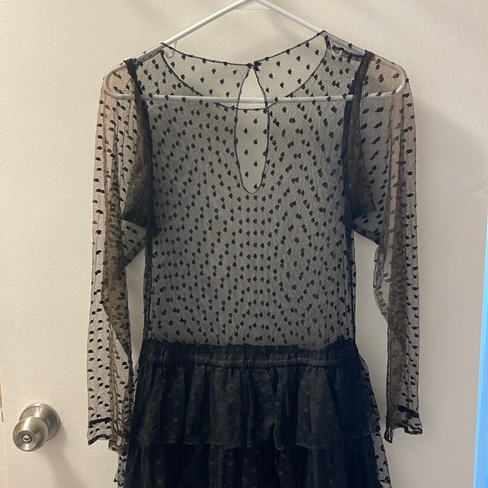 Vintage stretch and beautifully layered lace dress. Has some stretch.